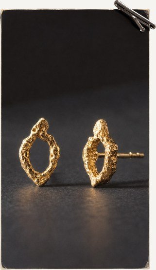 A pair of gold drop earrings