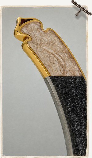 Gold and blackened claw pendant