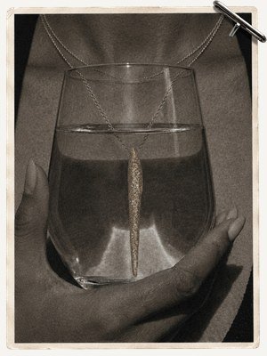 Stacked rings held around a glass